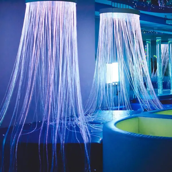 Fiber optic curtain for sensory rooms